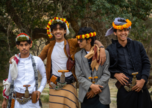 Portrait of flower men wearing floral crowns, Asir province, Sarat Abidah, Saudi Arabia