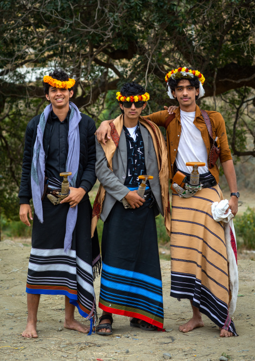 Portrait of flower men wearing floral crowns, Asir province, Sarat Abidah, Saudi Arabia