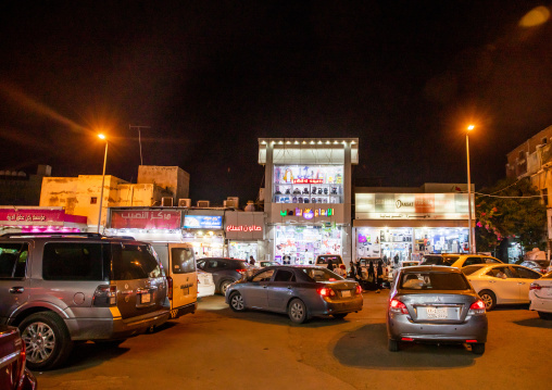 Cars parked in front of souq Dakhli, Jizan Province, Jizan, Saudi Arabia