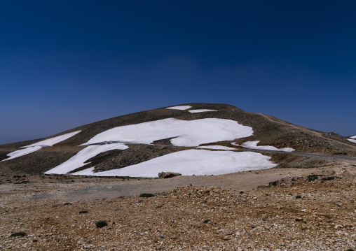 Road in the mountain with patches of snow, North Governorate, Daher el Kadib, Lebanon