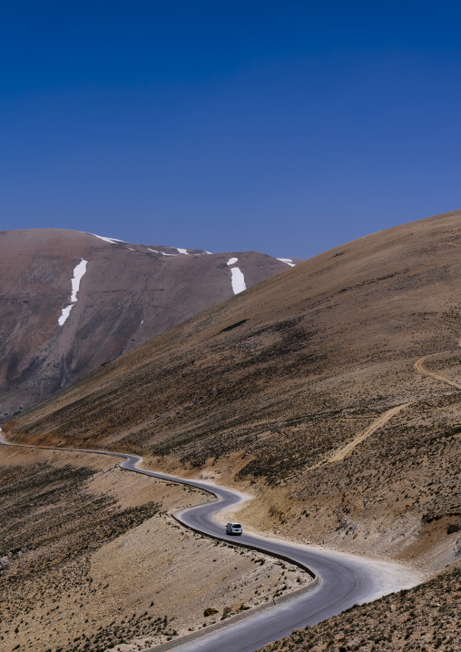 Road in the mountain with patches of snow, North Governorate, Daher el Kadib, Lebanon
