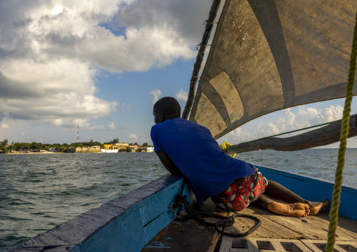Man sailing on a dhow, Nampula Province, Island of Mozambique, Mozambique