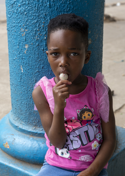Portrait of a girl with a lollipop, Maputo Province, Maputo, Mozambique