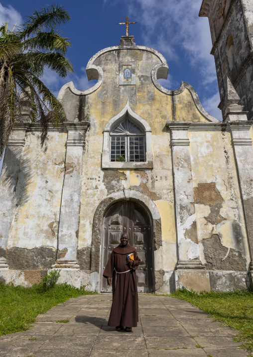 Monk in front of the Cathedral of Our Lady of the Immaculate Conception, Inhambane Province, Inhambane, Mozambique