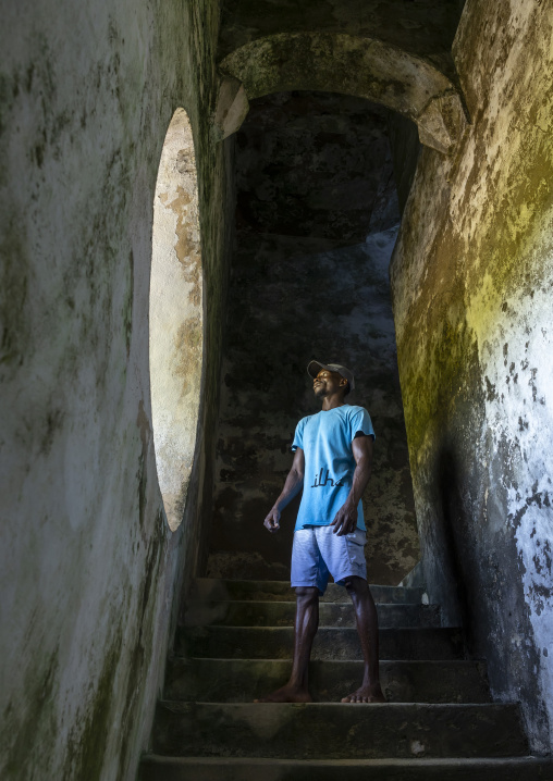 Man inside the lighthouse of Goa Island, Nampula Province, Island of Mozambique, Mozambique