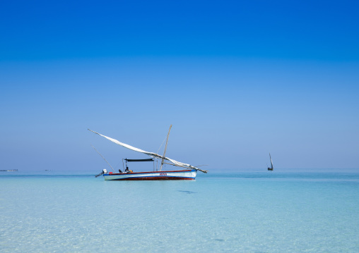 Dhow on turquoise water, Nampula Province, Island of Mozambique, Mozambique
