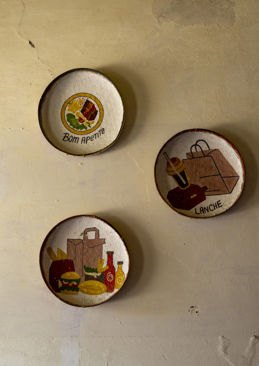 Plates decoration on a wall in a restaurant, Nampula Province, Island of Mozambique, Mozambique
