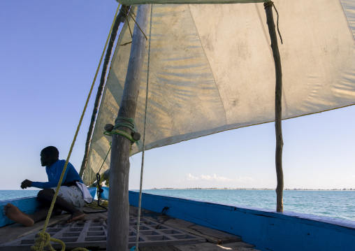 Man sailing on a dhow, Nampula Province, Island of Mozambique, Mozambique
