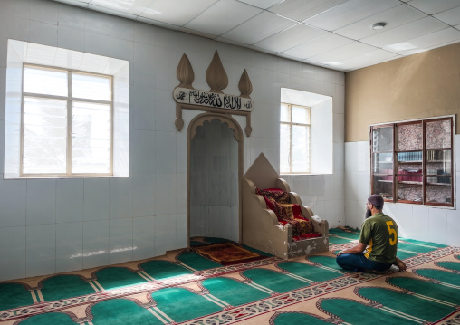 Muslim man praying in a mosque, Inhambane Province, Inhambane, Mozambique