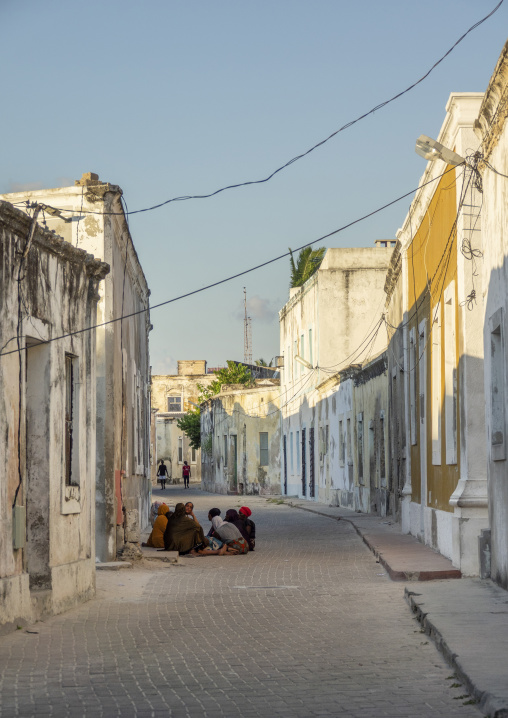 Women chatting in the streets of stone town, Nampula Province, Island of Mozambique, Mozambique