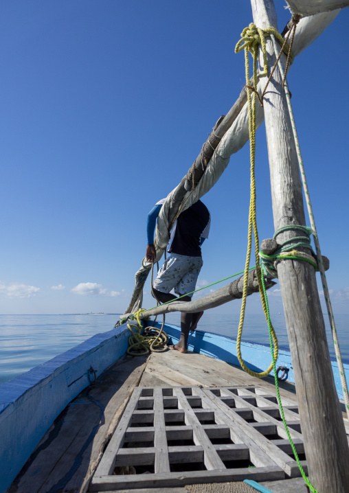 Man sailing on a dhow, Nampula Province, Island of Mozambique, Mozambique
