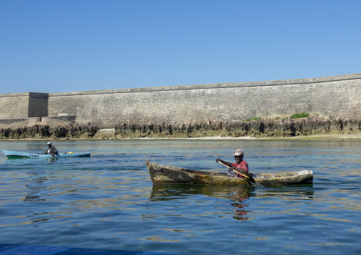 Fishermen in canoes in front of Saint Sebastian Fortress, Nampula Province, Island of Mozambique, Mozambique