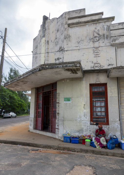 Women selling food in front of an old portuguese building, Inhambane Province, Inhambane, Mozambique