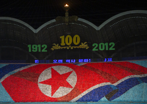 Children holding up boards during Arirang to create national flag, DGC, Pyongyang, North Korea