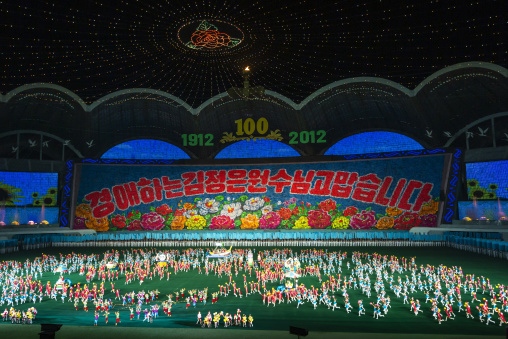 Children holding up boards during Arirang to make flowers, DGC, Pyongyang, North Korea