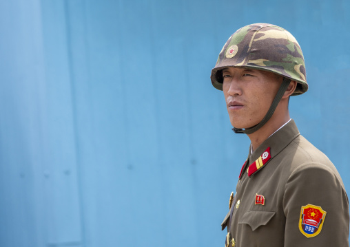 North Korean soldier with helmet standing in the DMZ, North Hwanghae, Panmunjom, North Korea