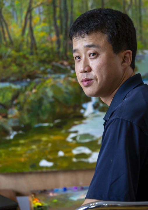 North Korean state artist in his workshop at Mansudae art studio, DGC, Pyongyang, North Korea