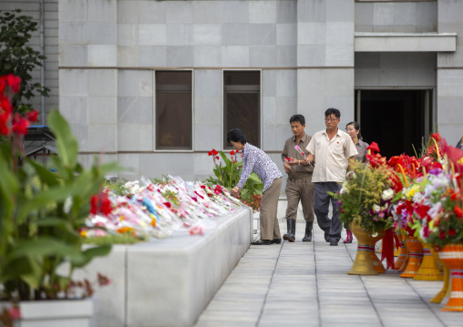 North Korean people paying respect to the Leaders in Mansudae art studio, DGC, Pyongyang, North Korea
