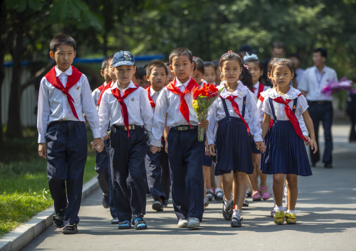 North Korean pioneers in the street, DGC, Pyongyang, North Korea