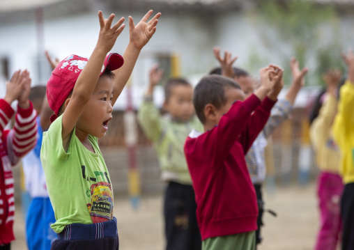 North Korean children making morning gymnastics at school, South Hamgyong, Hamhung, North Korea