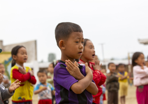 North Korean children making morning gymnastics at school, South Hamgyong, Hamhung, North Korea
