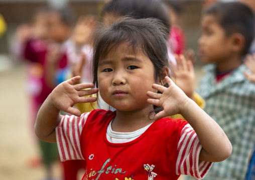 North Korean children making morning gymnastics at school, South Hamgyong, Hamhung, North Korea