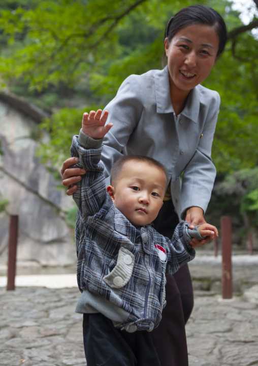 North Korean mother and son in a park, North Hwanghae, Kaesong, North Korea