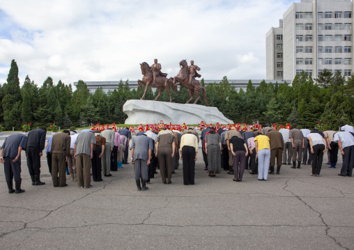 North Korean people paying respect to the Leaders in Mansudae art studio, DGC, Pyongyang, North Korea