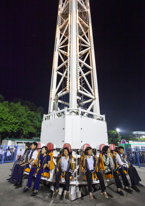 North Korean people in an attraction in Kaeson youth park, DGC, Pyongyang, North Korea