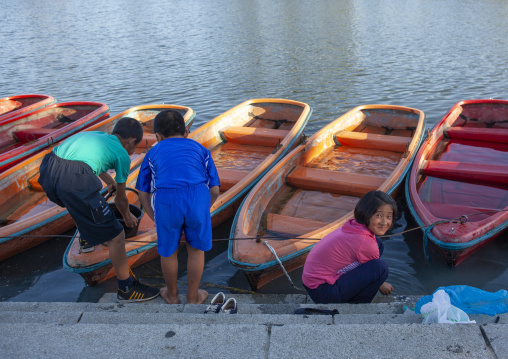 Children washing  clothes in Songdowon international children's camp, Kangwon Province, Wonsan, North Korea