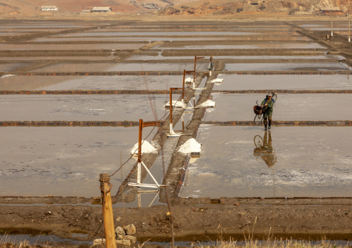 North Korean people working in salt evaporation ponds, South Pyongan, Nampo, North Korea