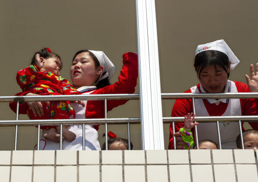 North Korean children in an orphanage with nurses, South Pyongan, Nampo, North Korea