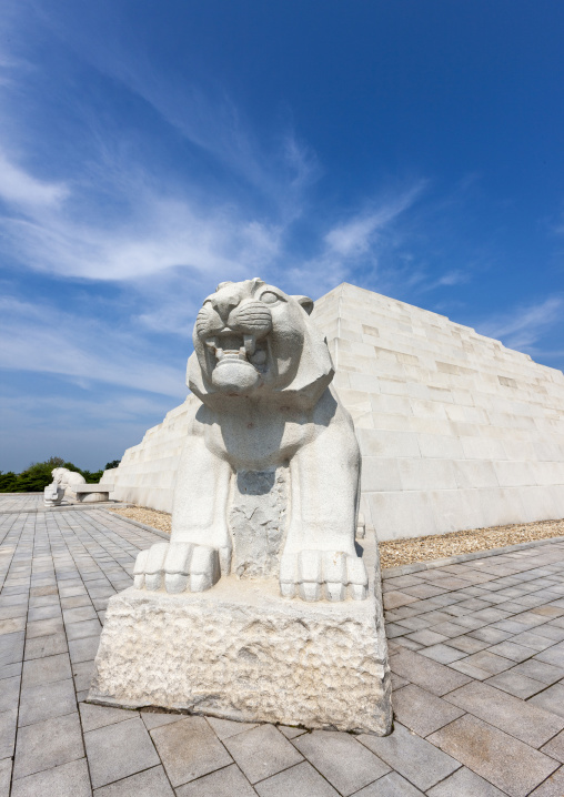 Tiger statue in front of the tomb of king tangun with a pyramid shape, DGC, Pyongyang, North Korea