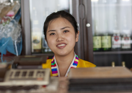 North Korean woman in a shop, DGC, Pyongyang, North Korea