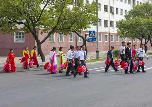 People going to the celebration of the 60th anniversary of the regim, DGC, Pyongyang, North Korea