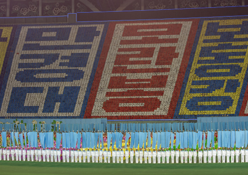 Children pixels holding up colored boards during Arirang mass games, DGC, Pyongyang, North Korea