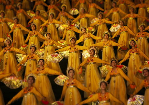 Women dancing in choson-ot during the Arirang mass games, DGC, Pyongyang, North Korea