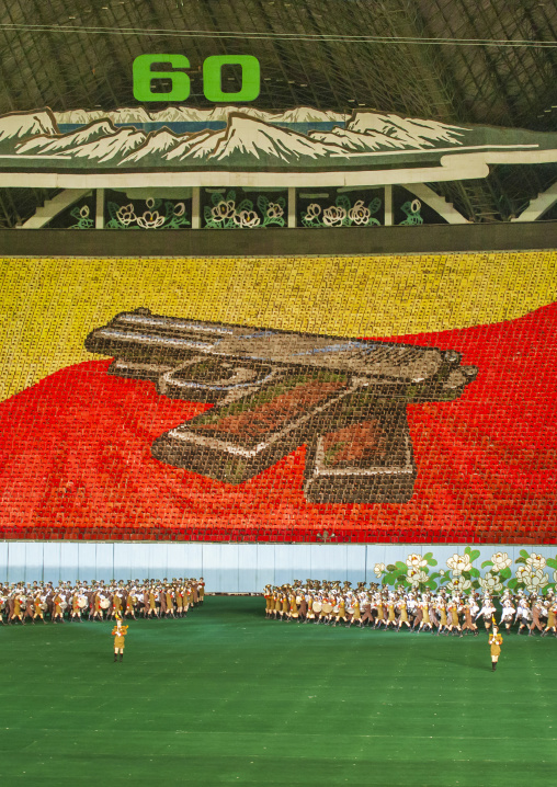 Children holding up boards during Arirang to create Kim Il Sung pistol, DGC, Pyongyang, North Korea