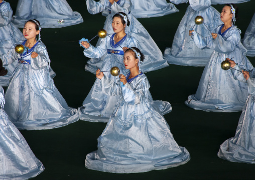 Women dancing in choson-ot during the Arirang mass games, DGC, Pyongyang, North Korea
