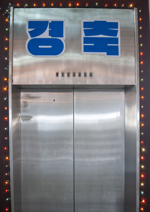 Elevator in a clothes shop, DGC, Pyongyang, North Korea