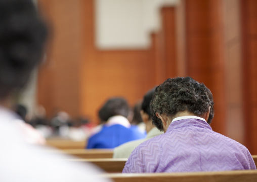 North Korean women reading bible in protestant Bongsu church, DGC, Pyongyang, North Korea