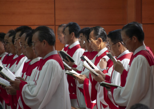 North Korean men singing in protestant Bongsu church, DGC, Pyongyang, North Korea