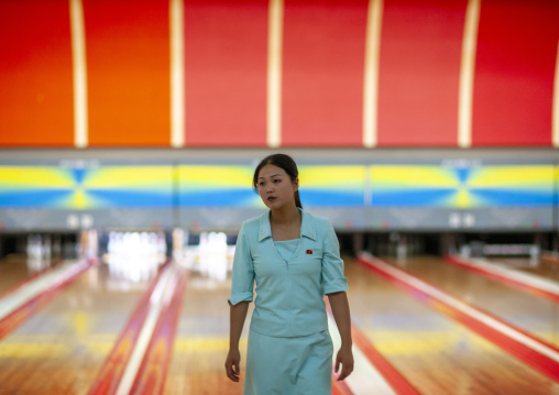 North Korean woman playing bowling, DGC, Pyongyang, North Korea