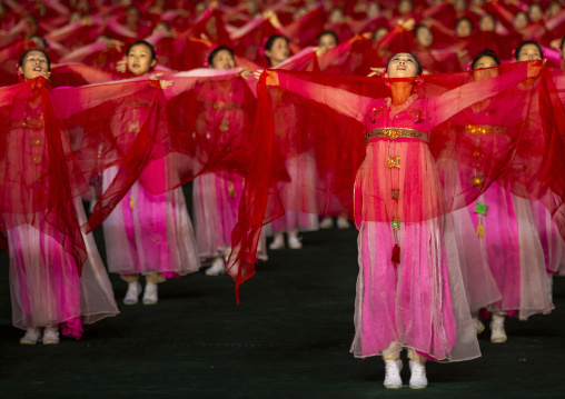 Women dancing in choson-ot during the Arirang mass games, DGC, Pyongyang, North Korea