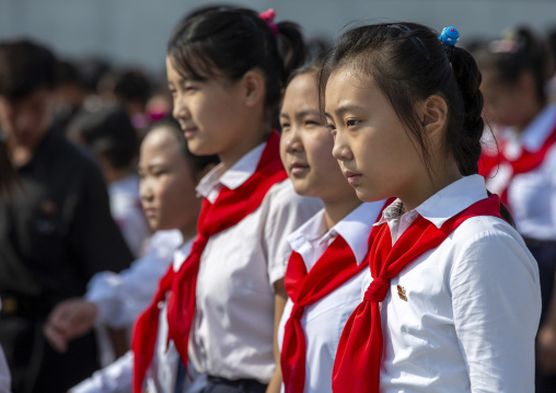 Pioneers girls from the Korean children's union in the Grand monument, DGC, Pyongyang, North Korea