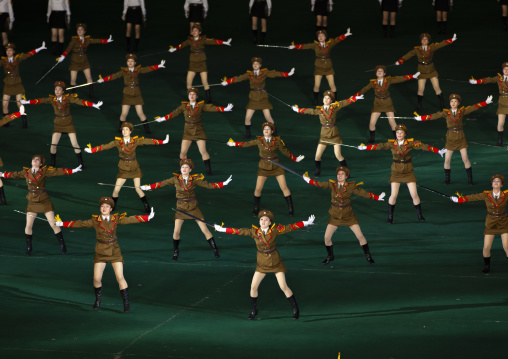 North Korean women dressed as soldiers dancing with swords in Arirang, DGC, Pyongyang, North Korea