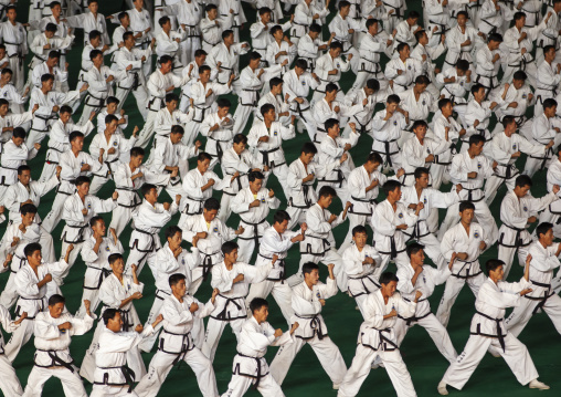 Taekwando men during the Arirang mass games, DGC, Pyongyang, North Korea