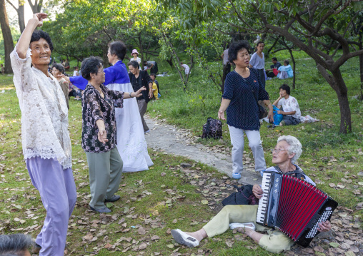 North Korean women having fun in a park on national day, DGC, Pyongyang, North Korea