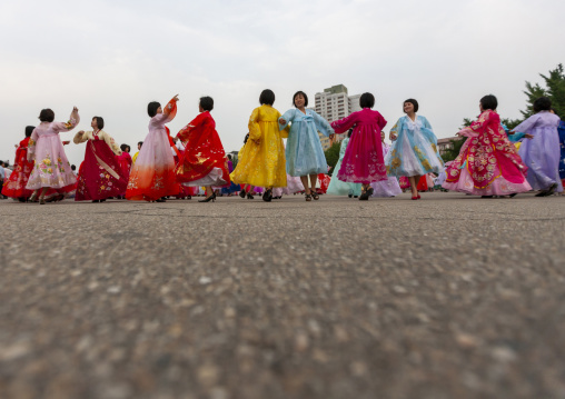 Students dancing on day of the foundation of the republic, DGC, Pyongyang, North Korea