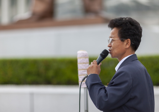 Speaker with a microphone in Mansudae Grand monument, DGC, Pyongyang, North Korea